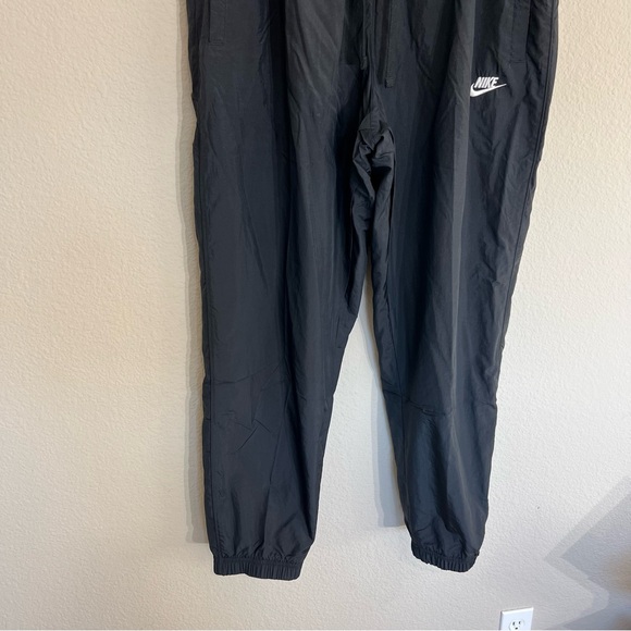 NWT Men’s Nike woven nylon tapered track pants standard fit sz XXL black active - Picture 5 of 14